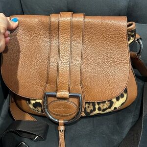 Dolce & Gabbana leopard skin cross body bag with brown leather flap.